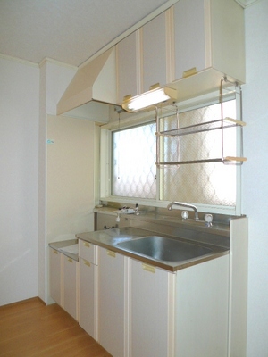 Kitchen. It is a small window There is also a bright kitchen