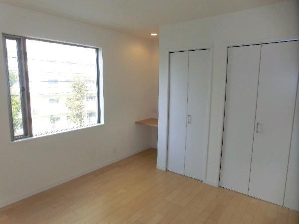 Non-living room. Master bedroom with a large storage and desk furniture.