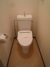 Toilet. A heated toilet seat