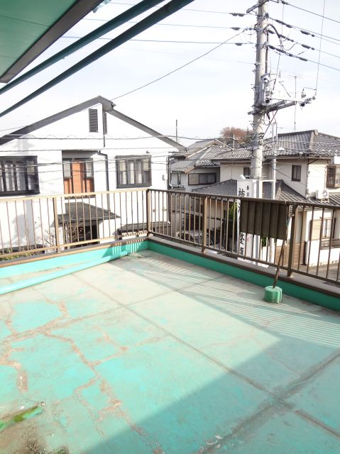 Balcony. Wide with a roof balcony