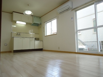 Living and room. Bright day refers from large windows