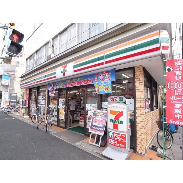 Convenience store. Seven-Eleven Higashiomiya store up (convenience store) 428m