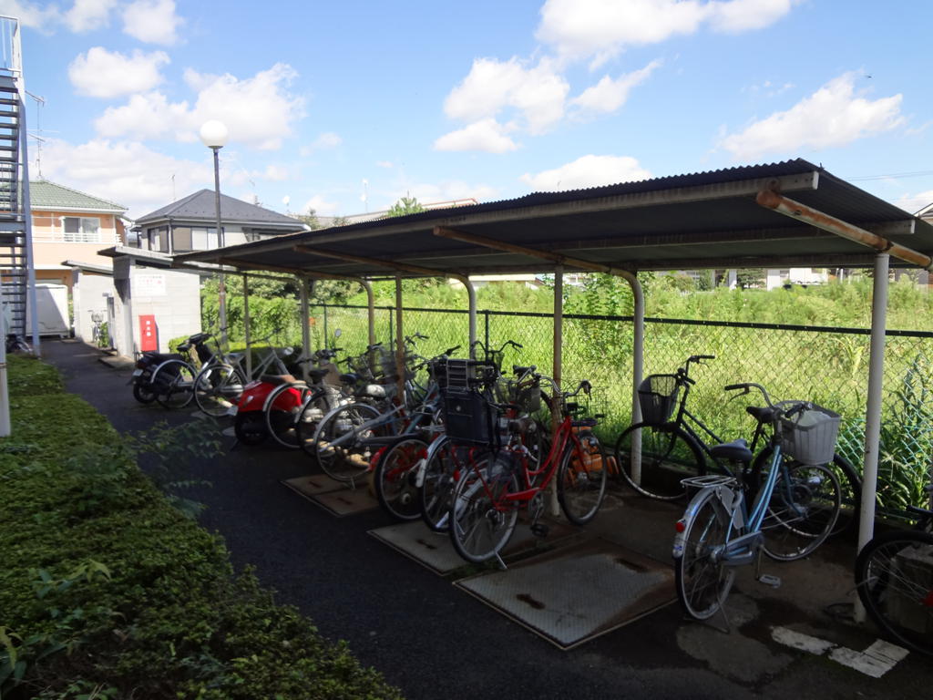 Parking lot. Bicycle parking is covered!
