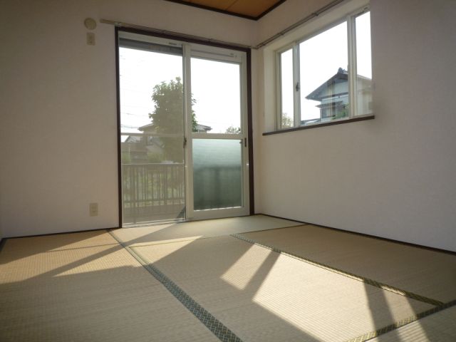 Living and room. In all the room angle room, There is also a bay window!