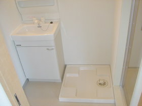 Washroom. With separate wash basin