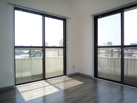 Living and room. It is a bright room with two-sided balcony. 