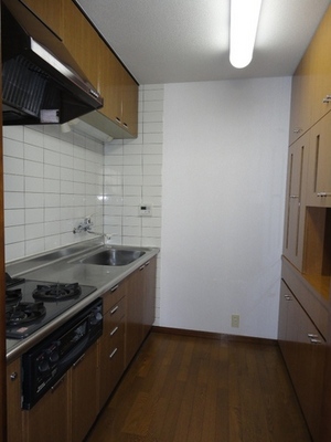 Kitchen. I'm glad the wall full of cupboards