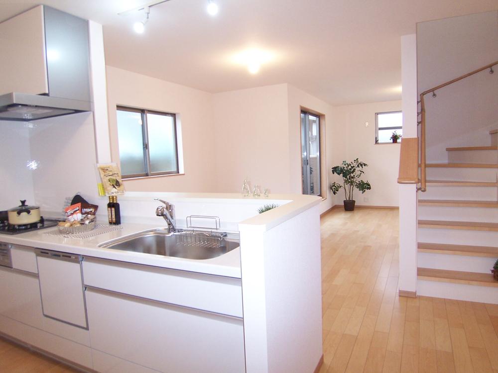 Living. Living stairs.  By installing the stairs in the living room, Produce a natural interaction with your family while are in the kitchen and living room. Ties are deepening plan about live. 