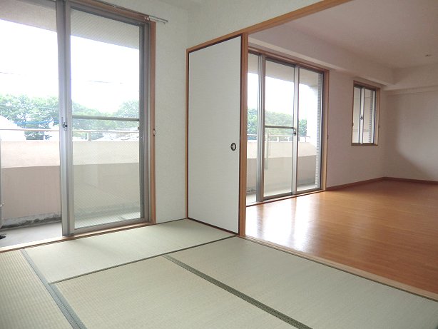 Living and room. Lush Hikawa approach from living room and Japanese-style room facing the wide balcony