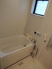 Bath. Possible reheating, It is a bathroom with windows.
