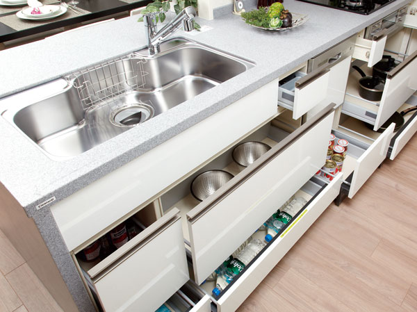 Kitchen.  [All slide storage] Large frying pan also can be stored, It has adopted and out easily sliding.