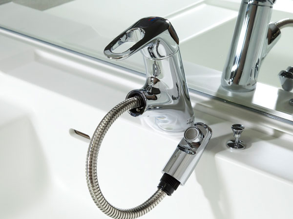 Bathing-wash room.  [Single lever mixing faucet] Single lever mixing faucet that can be adjusted hot water with one hand.
