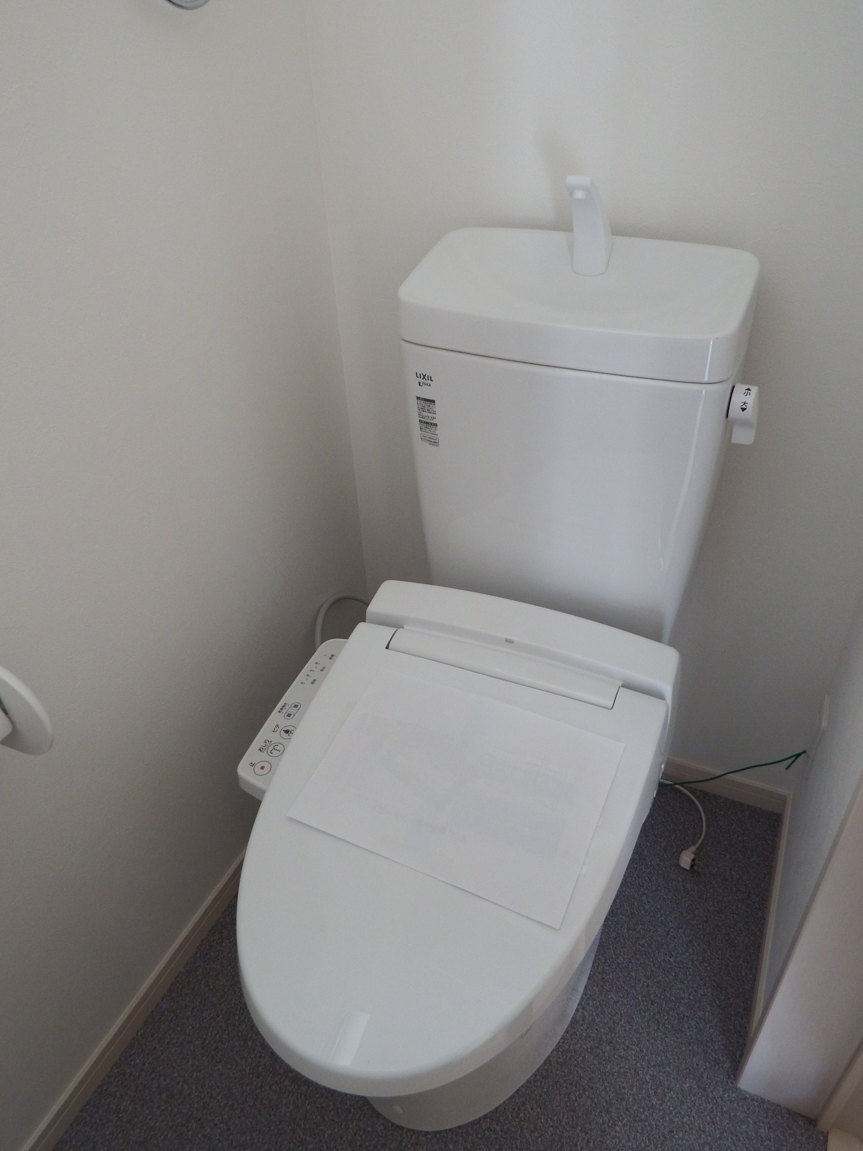 Toilet. Photos of the preceding model house (same equipment you plan to use)