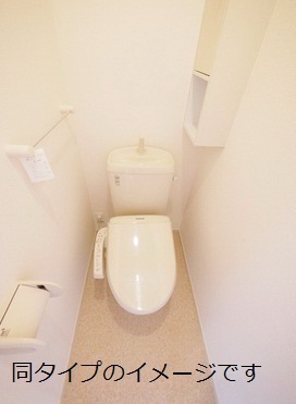 Toilet. Image is a photograph
