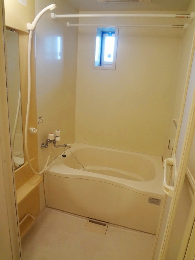 Bath. It is a photograph of the same property another room