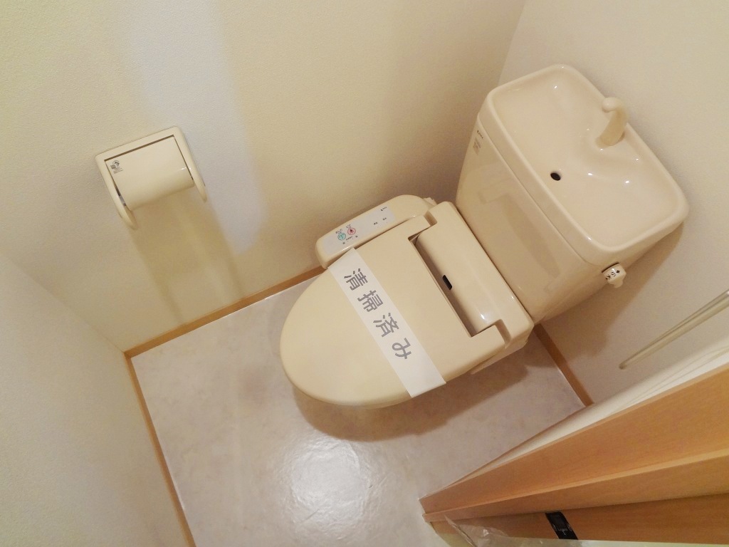 Toilet. It is a photograph of the same property another room