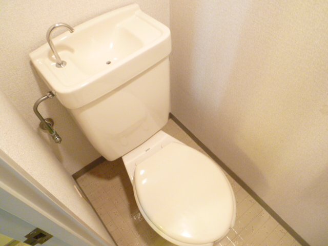 Toilet. Same property, Is another of the room.