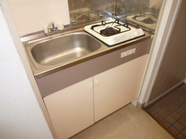 Kitchen. Same property, It is a photograph of a different type of room