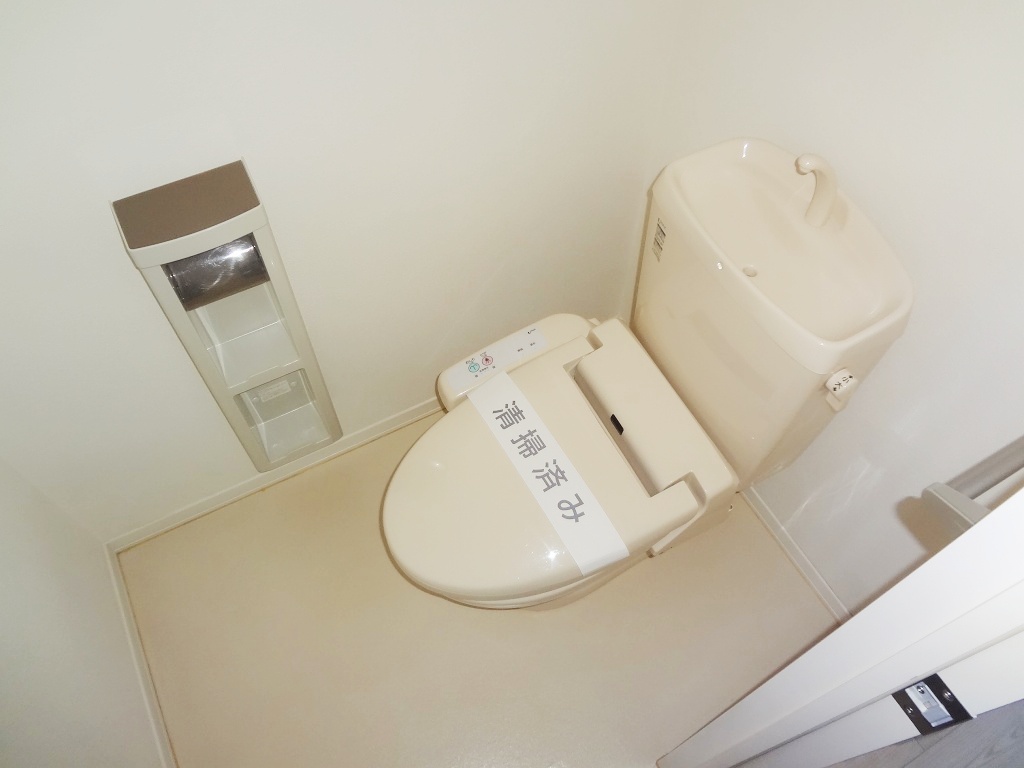 Toilet. It is a photograph of the same property another room