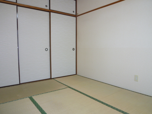 Other room space. It is a photograph of the same type of room