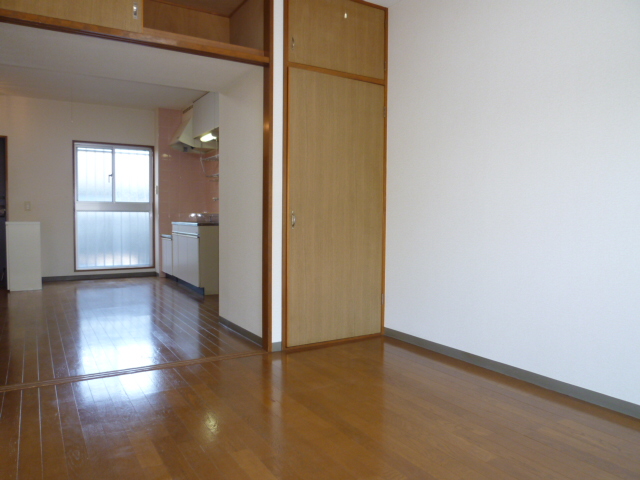 Other room space. It is a photograph of the same type of room