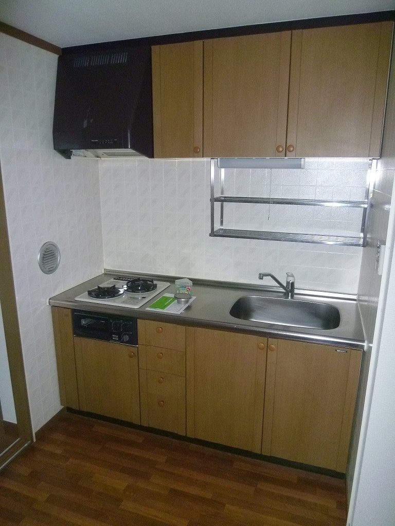 Kitchen. It is a photograph of another room of the same properties