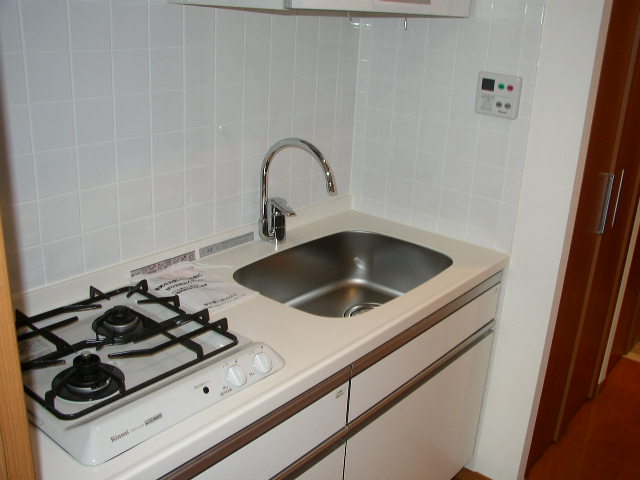 Kitchen. Same property, It is a photograph of another room