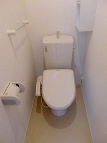 Toilet. It is a warm water washing toilet seat. (Same construction type)