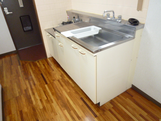 Kitchen. It is a photograph of the same type of room