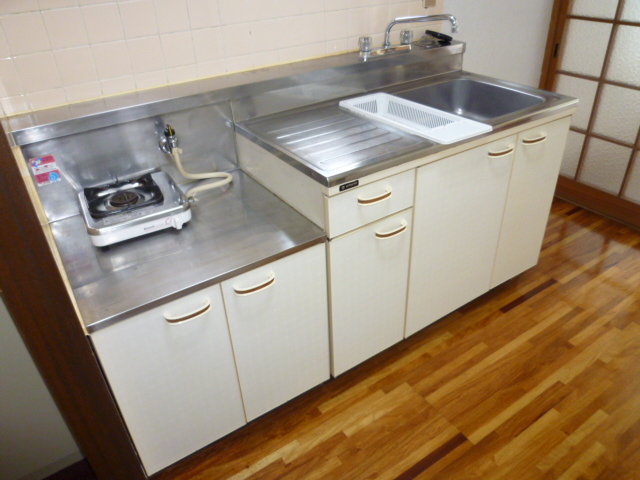 Kitchen. It is a photograph of the same type of room