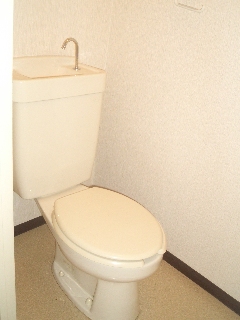 Toilet. Same property, Is another of the room.