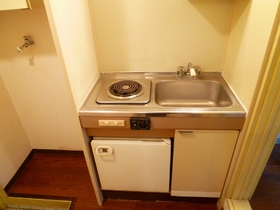 Kitchen. A kitchen with a mini-fridge ☆