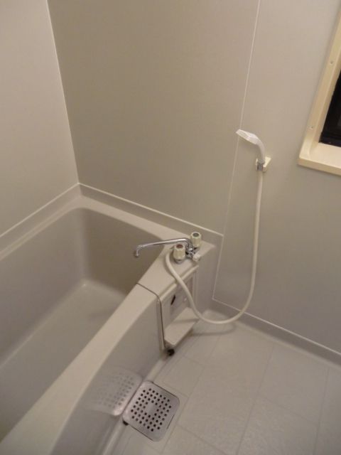 Bath. White is a spacious bathtub with clean which was the keynote.