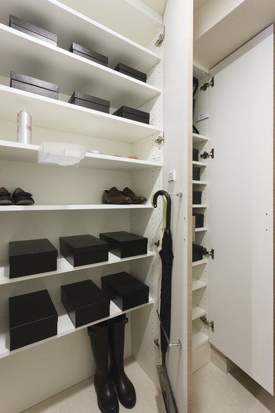 Boots, or the like can be stored securely "shoe box"