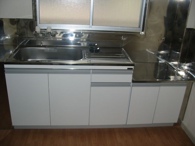 Kitchen. Two-burner gas stove corresponding sink also spacious