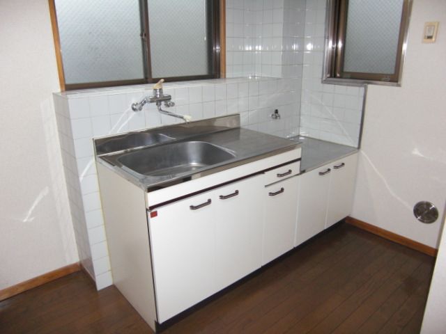 Kitchen. Two-burner gas stove corresponding sink also spacious