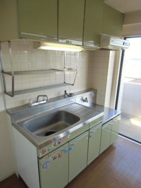 Kitchen. It is spacious kitchen space.