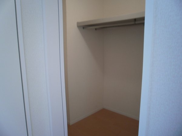 Receipt. It is a photograph of the same type. Walk-in closet is a storage capacity large.