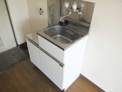 Kitchen. It is a mini kitchen to install a gas stove