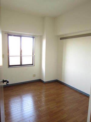 Living and room. There is a window because it is a corner room