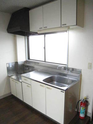 Kitchen. There is a window in the kitchen! Into any ventilation OK light!