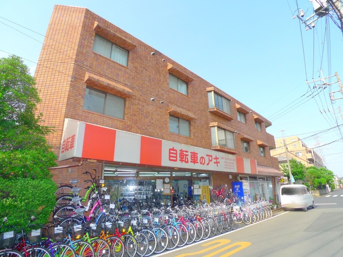 Building appearance. 1F is a bicycle shop. 