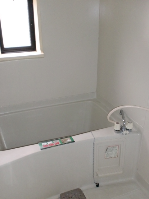 Bath. Image is another room