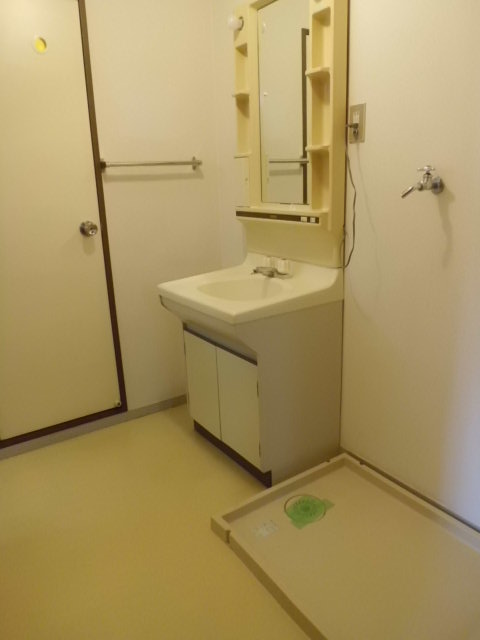 Washroom. Independent wash basin and washing machine Storage. Washing bread is also there peace of mind.