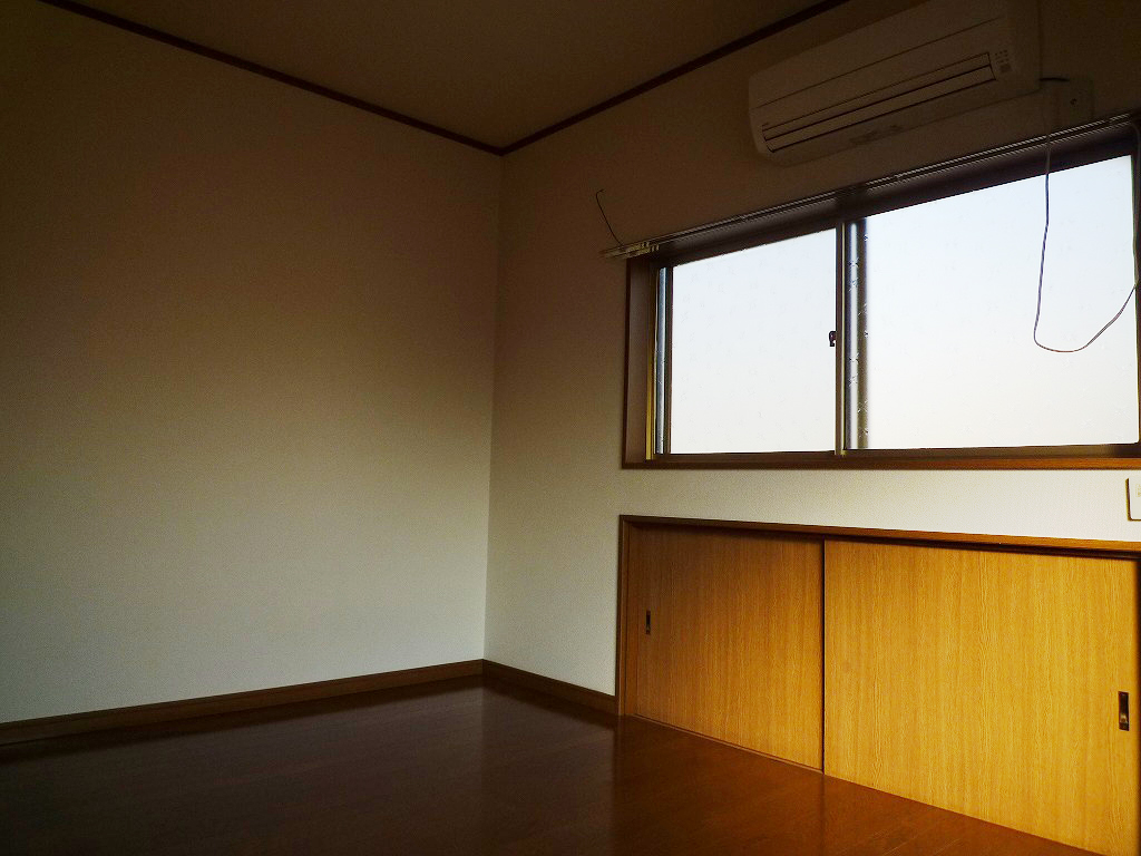 Living and room. There is storage under the window