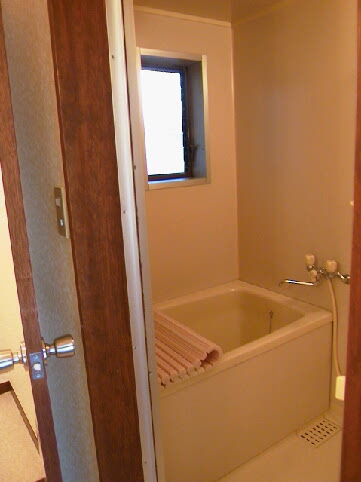 Bath. Convenient small window with a bathroom ventilation.