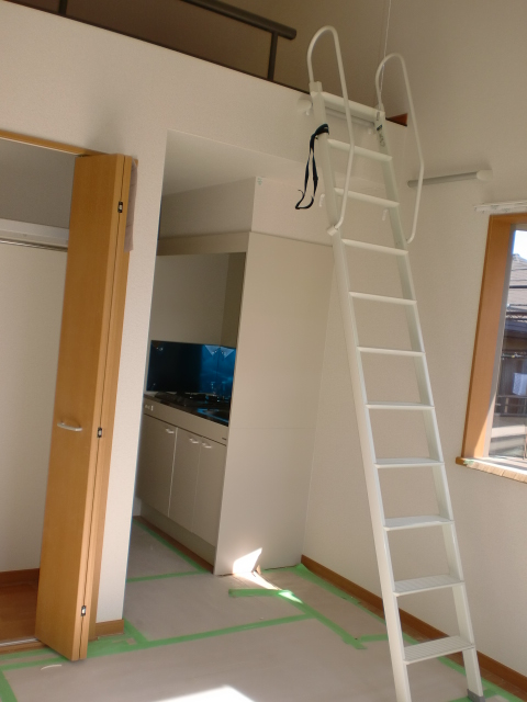 Living and room. There are ceiling high feeling of opening in the loft