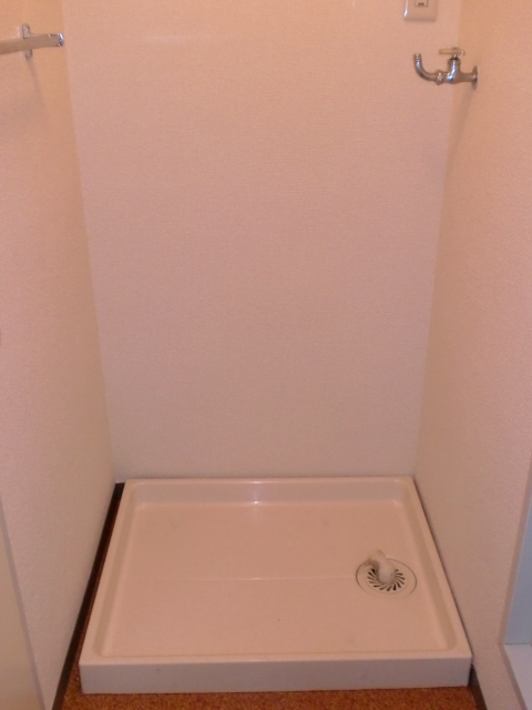Other Equipment. Washing machine in the room