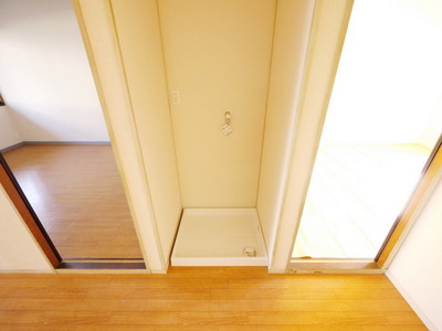Other room space. Washing machine in the room