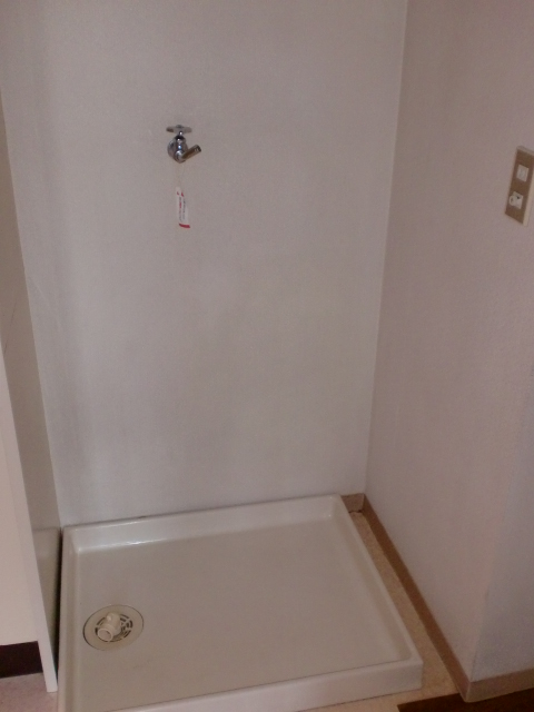 Other Equipment. Washing machine in the room